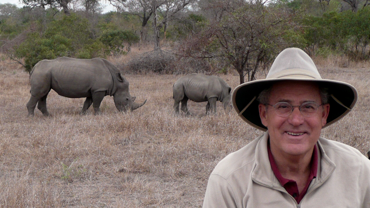 Joseph in South Africa with rhinos